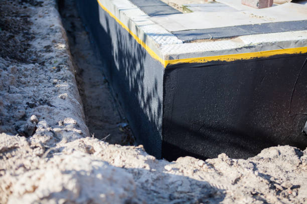 Professional Waterproofing technician working in Bowersville, OH